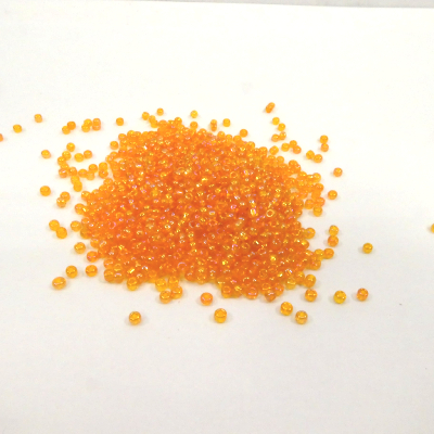 Perles de rocailles orange/rosé 2 mm