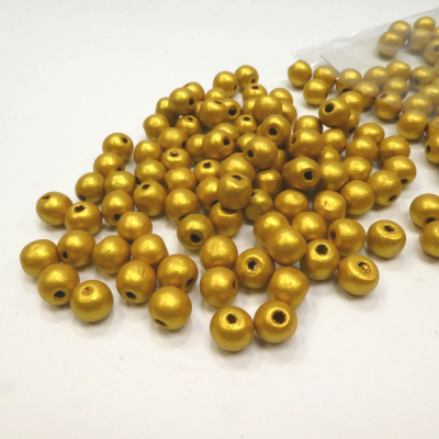 Les perles en bois argentées ou dorées
